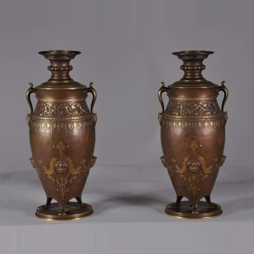 Ferdinand LEVILLAIN (1837 - 1905) Pair of Napoleon III lamps, in gilded an brown patinated bronze