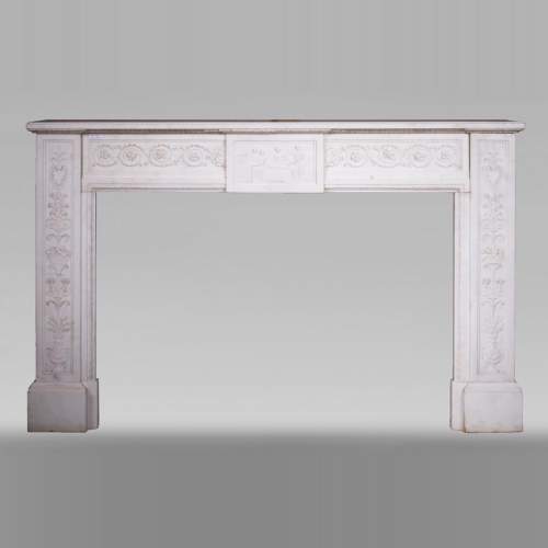 Carrara marble mantel with Vulcan's forge cartouche