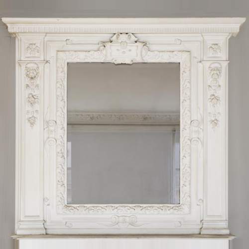 Antique Louis XIV style pierglass with lions heads decor