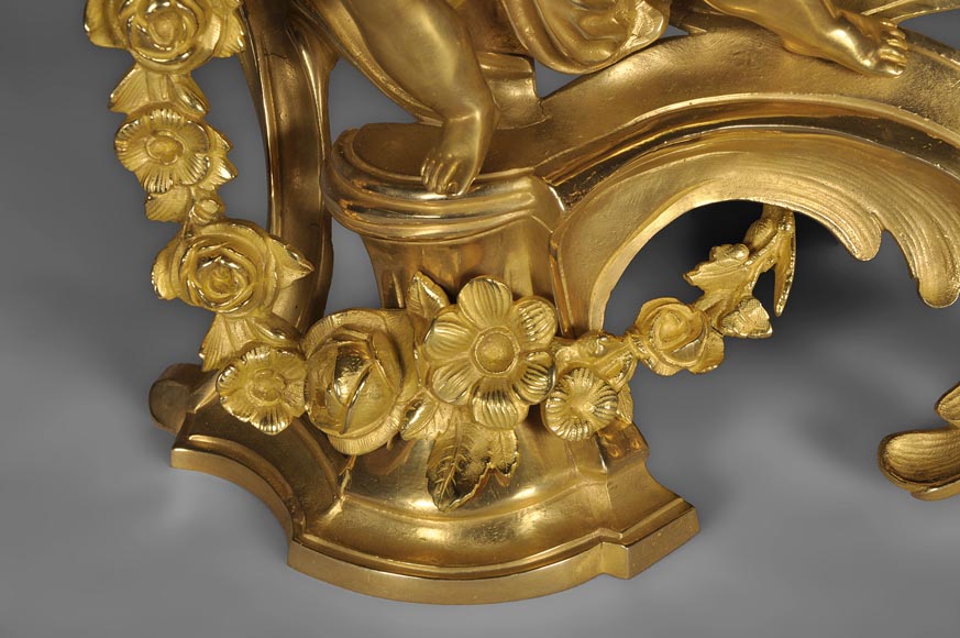 Antique Louis XV style andirons made out of gilded bronze with putti decor Antique Louis XV style andirons made out of gilded bronze with putti decor-2