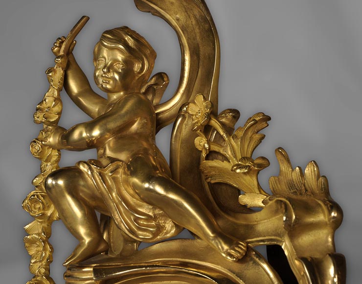 Antique Louis XV style andirons made out of gilded bronze with putti decor Antique Louis XV style andirons made out of gilded bronze with putti decor-3