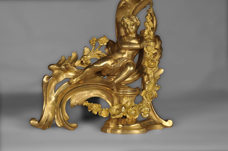 Antique Louis XV style andirons made out of gilded bronze with putti decor Antique Louis XV style andirons made out of gilded bronze with putti decor-4