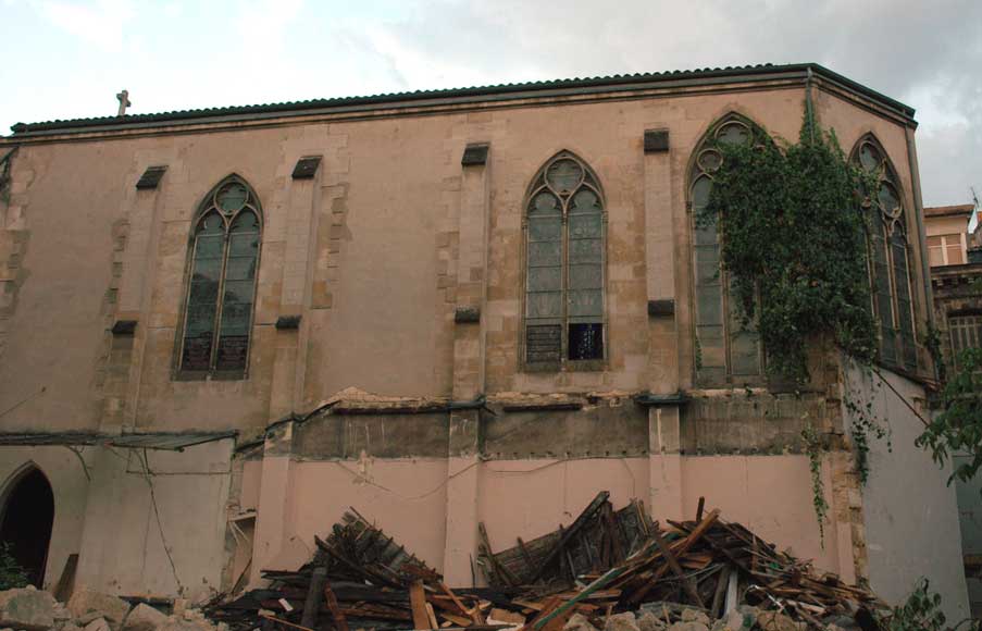 Stained glass window from a chapel with Saint Anne as central figure Stained glass window from a chapel with Saint Anne as central figure -4