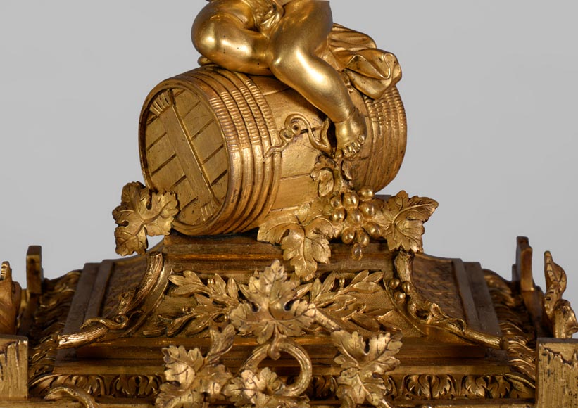 A Napoleon III style clock made out of porcelain and gilded bronze representing Bacchus, god of wine A Napoleon III style clock made out of porcelain and gilded bronze representing Bacchus, god of wine-3