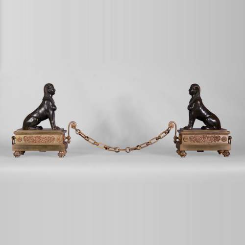 Antique Empire style pair of andirons with Sphinxes, gilt bronze and brown patina bronze