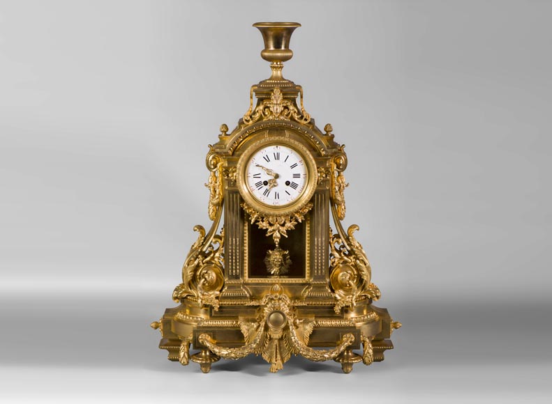 Important Louis XVI style gilt bronze clock with solar mask, Napoleon 3 period Important Louis XVI style gilt bronze clock with solar mask, Napoleon 3 period-0