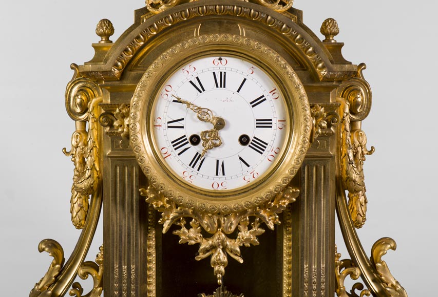 Important Louis XVI style gilt bronze clock with solar mask, Napoleon 3 period Important Louis XVI style gilt bronze clock with solar mask, Napoleon 3 period-1