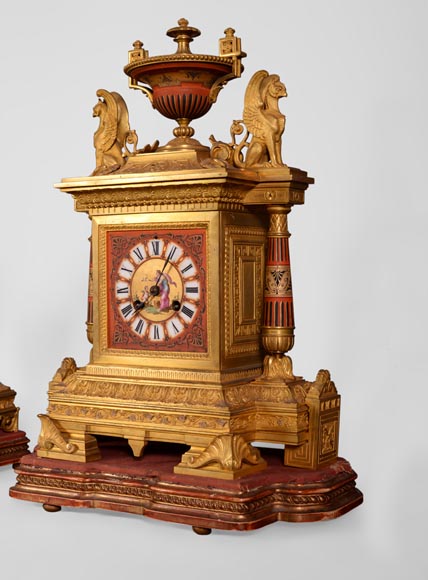 Porcelain and gilded bronze clock set with griffin Porcelain and gilded bronze clock set with griffin-1