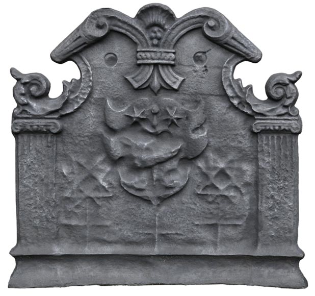 Antique cast iron fireback with coat of arms with a sword and two stars, two ionic pilasters and leather cut pattern, late 17th century Antique cast iron fireback with coat of arms with a sword and two stars, two ionic pilasters and leather cut pattern, late 17th century -0