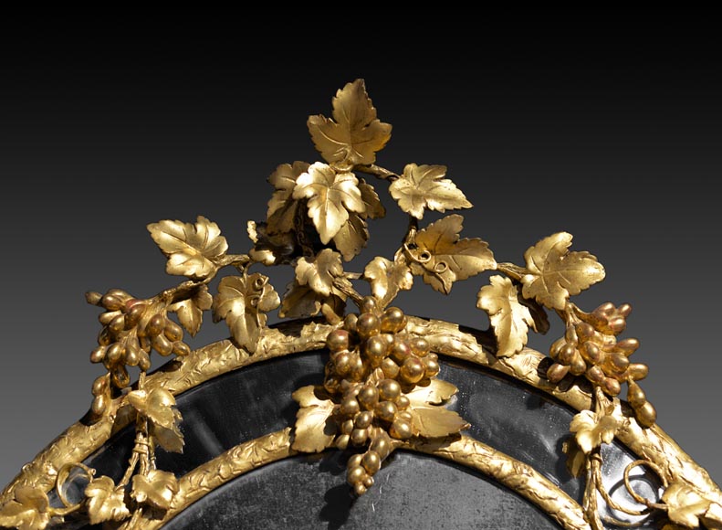 Very beautiful antique Napoleon III oval mirror decorated with bunches of grapes and grape leaves Very beautiful antique Napoleon III oval mirror decorated with bunches of grapes and grape leaves-1