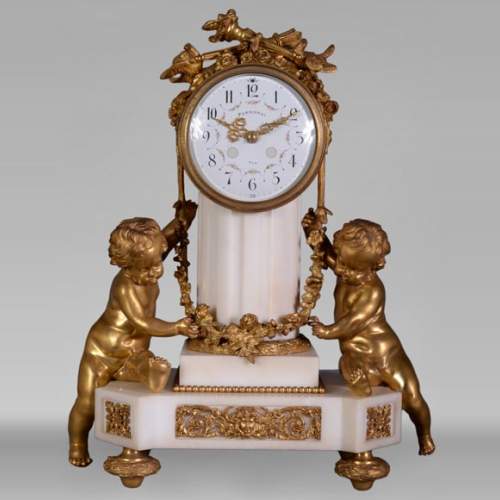 Louis XVI style little clock with putti by Perrineau