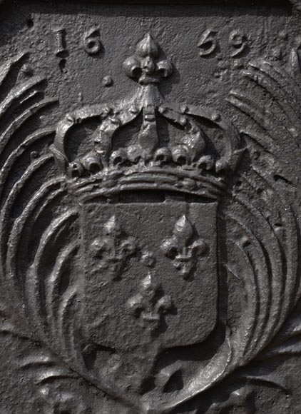 Antique cast iron fireback with the French coat of arms dated 1659 Antique cast iron fireback with the French coat of arms dated 1659-1