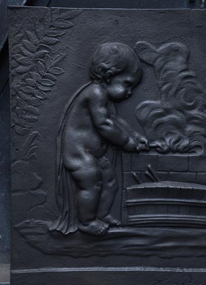 Putti Forging Cupid's Arrows, antique cast iron fireback Putti Forging Cupid's Arrows, antique cast iron fireback-1