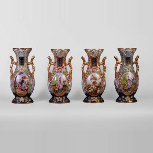 BAYEUX MANUFACTURE - Four vases with polychrome and gold decoration with Chinese