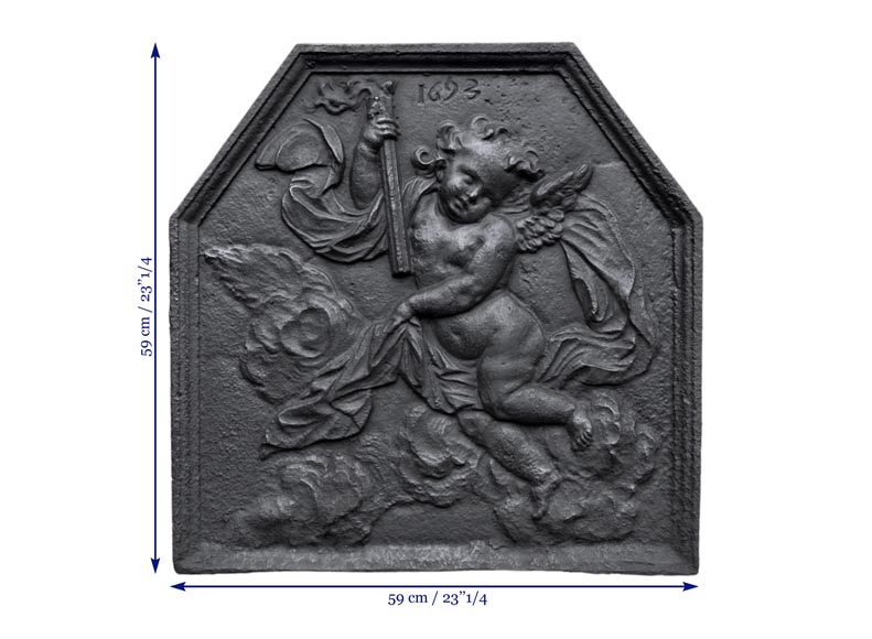 Antique fireback dated 1693 with winged putto holding a torch-5