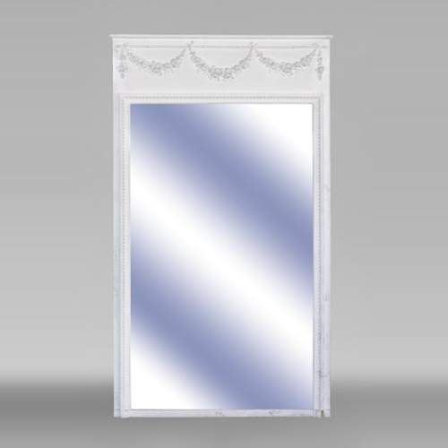 An antique large trumeau with garlands of flowers