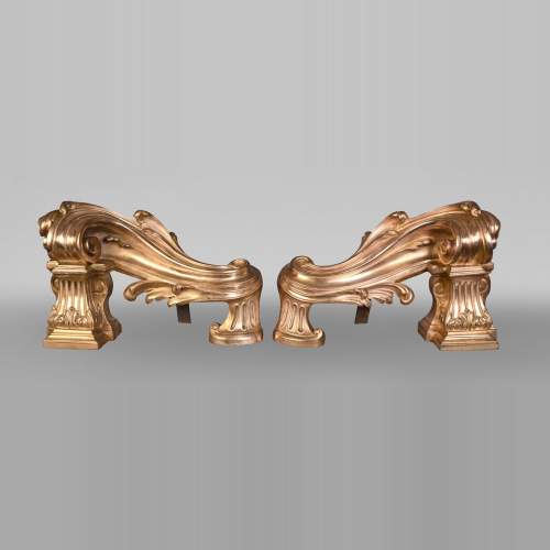 Pair of large-volute gilt bronze andirons, signed Henri Vian, late 19th century