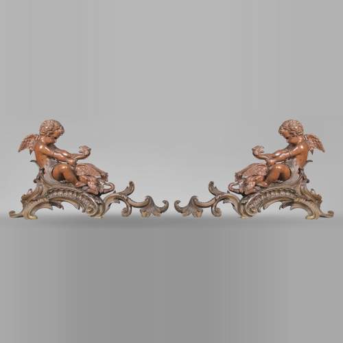 Pair of chenets, with putti and chimeras, made out of two patinas bronze