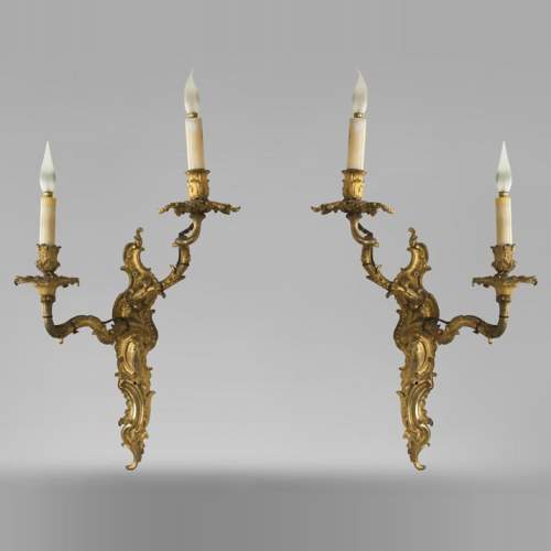 Pair of Louis XV gilded bronze wall lights