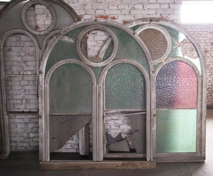 Arched wooden window frames and coloured glass Arched wooden window frames and coloured glass-6