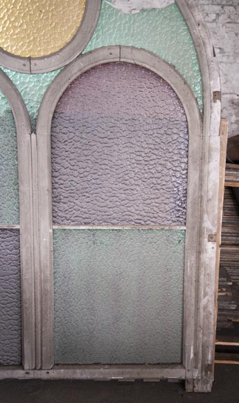 Arched wooden window frames and coloured glass Arched wooden window frames and coloured glass-10