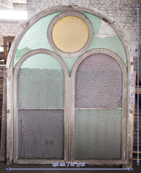Arched wooden window frames and coloured glass Arched wooden window frames and coloured glass-11