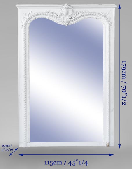 An antique Louis XV style overmantel with asymetric shell and crossbow pediment An antique Louis XV style overmantel with asymetric shell and crossbow pediment-6