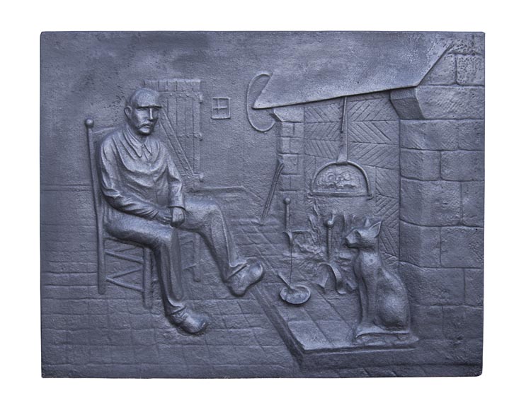 Modern fireback with a personage and his cat warming up by the fireplace Modern fireback with a personage and his cat warming up by the fireplace-0