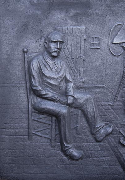 Modern fireback with a personage and his cat warming up by the fireplace Modern fireback with a personage and his cat warming up by the fireplace-2