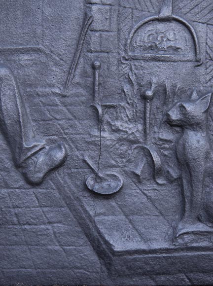 Modern fireback with a personage and his cat warming up by the fireplace Modern fireback with a personage and his cat warming up by the fireplace-4