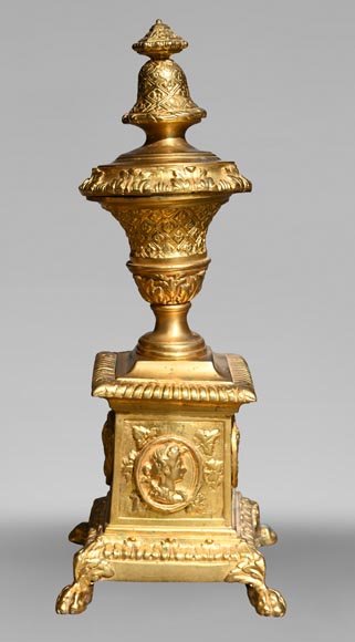 Pair of Louis XIV style gilt-bronze chenets decorated with profiles. Pair of Louis XIV style gilt-bronze chenets decorated with profiles.-1