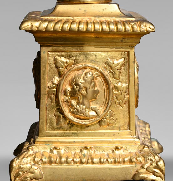 Pair of Louis XIV style gilt-bronze chenets decorated with profiles. Pair of Louis XIV style gilt-bronze chenets decorated with profiles.-2