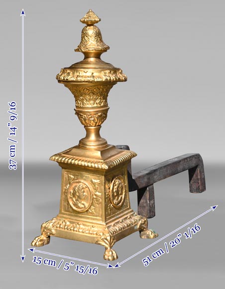 Pair of Louis XIV style gilt-bronze chenets decorated with profiles. Pair of Louis XIV style gilt-bronze chenets decorated with profiles.-7