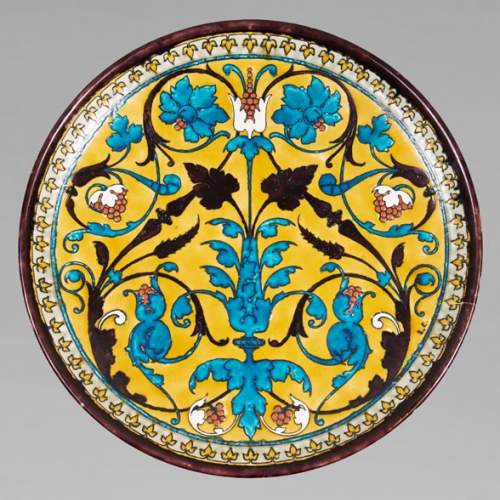 Théodore DECK (1823-1891) - Round ceramic dish with oriental decoration of a vase of flowers and foliage on yellow background