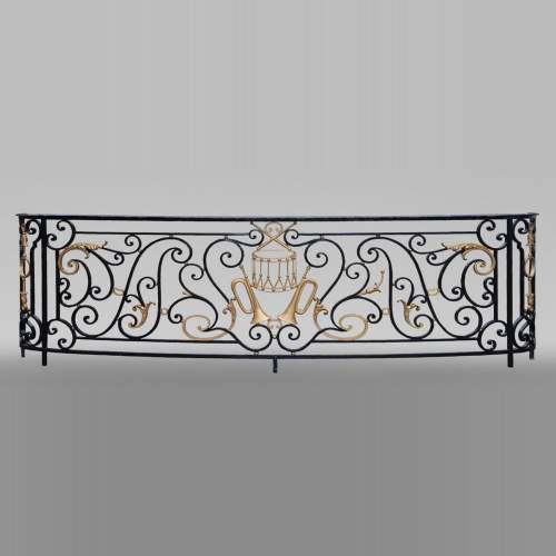 Antique Napoleon III wrought iron balcony with musical attributes