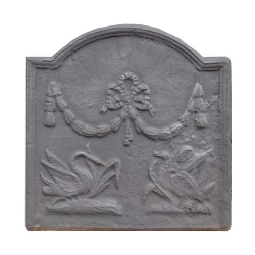 Small Louis XVI style cast iron fireback with a duck and a swann
