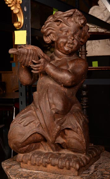 Cast iron statue fountain representing a child with a shell Cast iron statue fountain representing a child with a shell-1