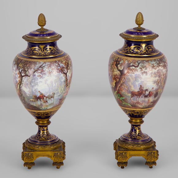 Pair of Sèvres porcelain vases mounted in gilt bronze and painted by J. Machereau, circa 1870 Pair of Sèvres porcelain vases mounted in gilt bronze and painted by J. Machereau, circa 1870-1