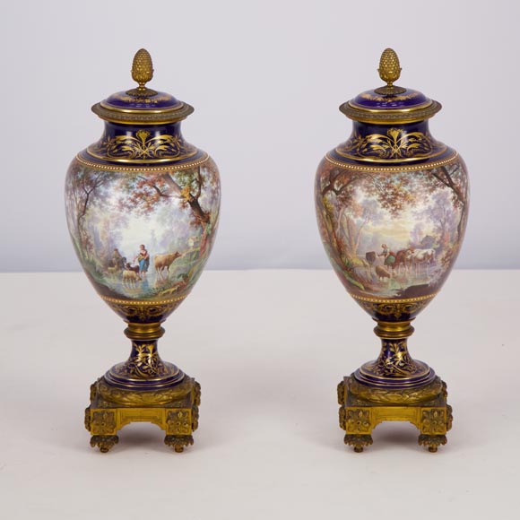 Pair of Sèvres porcelain vases mounted in gilt bronze and painted by J. Machereau, circa 1870 Pair of Sèvres porcelain vases mounted in gilt bronze and painted by J. Machereau, circa 1870-5