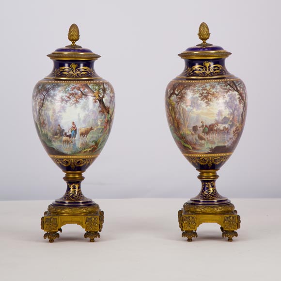 Pair of Sèvres porcelain vases mounted in gilt bronze and painted by J. Machereau, circa 1870 Pair of Sèvres porcelain vases mounted in gilt bronze and painted by J. Machereau, circa 1870-6