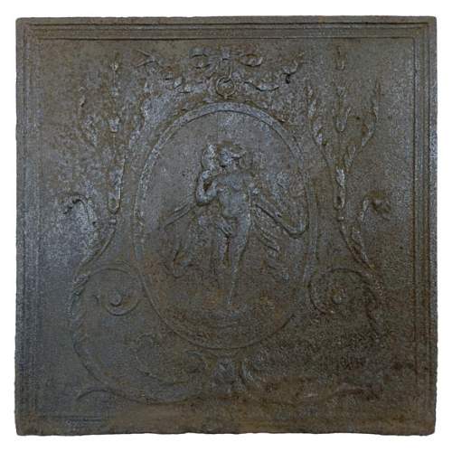 Cast iron fireback depicting Venus in a medallion