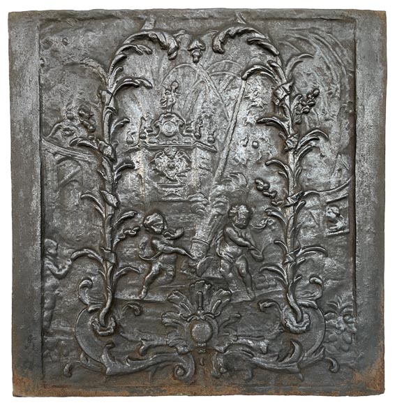 Antique fireback décorated with putti and a cannon, 19th century Antique fireback décorated with putti and a cannon, 19th century-0