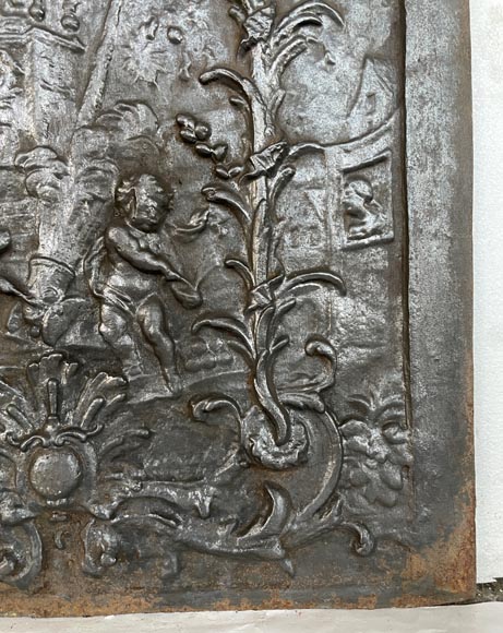 Antique fireback décorated with putti and a cannon, 19th century Antique fireback décorated with putti and a cannon, 19th century-5