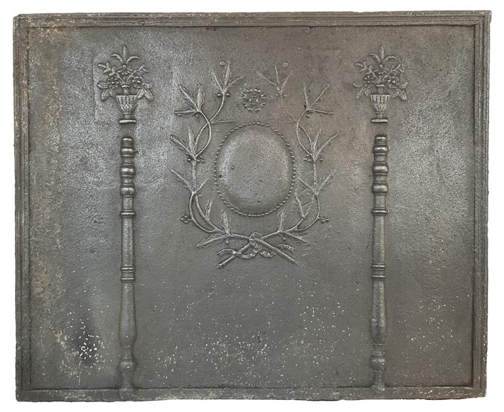 Antique fireback with Hercules columns and laurel branch Antique fireback with Hercules columns and laurel branch-0