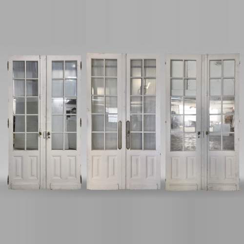 Series of three double wood doors with glasses