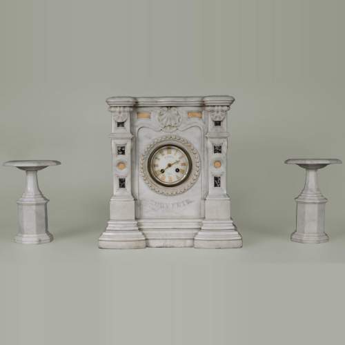 Set clock in Carrara marble taking the shape of a mantel
