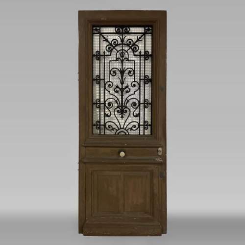 Oak front door with glass opening and wrought iron, 20th century