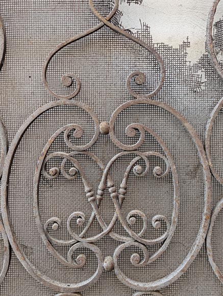 Pair of wrought iron front radiators with intertwined L Pair of wrought iron front radiators with intertwined L-5