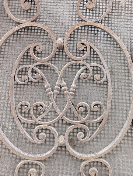 Pair of wrought iron front radiators with intertwined L Pair of wrought iron front radiators with intertwined L-6