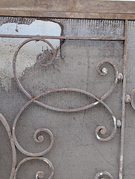 Pair of wrought iron front radiators with intertwined L Pair of wrought iron front radiators with intertwined L-7